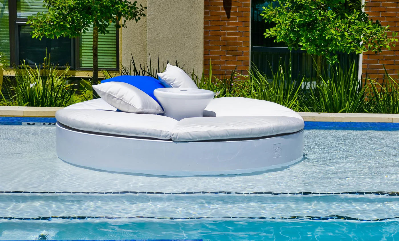Signature Round Sunbed With White Cushions.